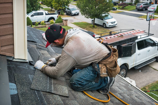 Professional Roof Replacement technician working in Waterbury Center, VT